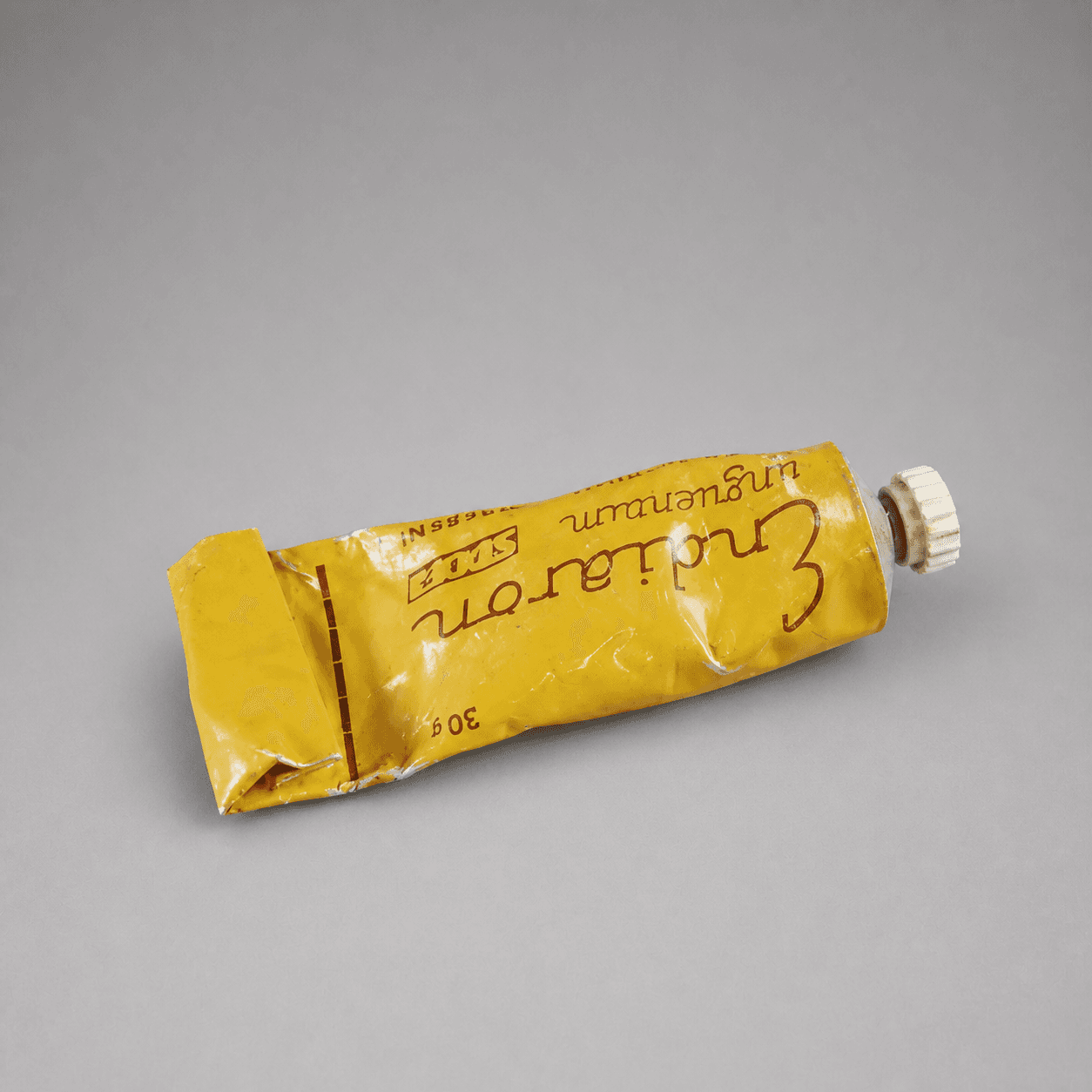 Yellow tube with a white cap — Photo 1