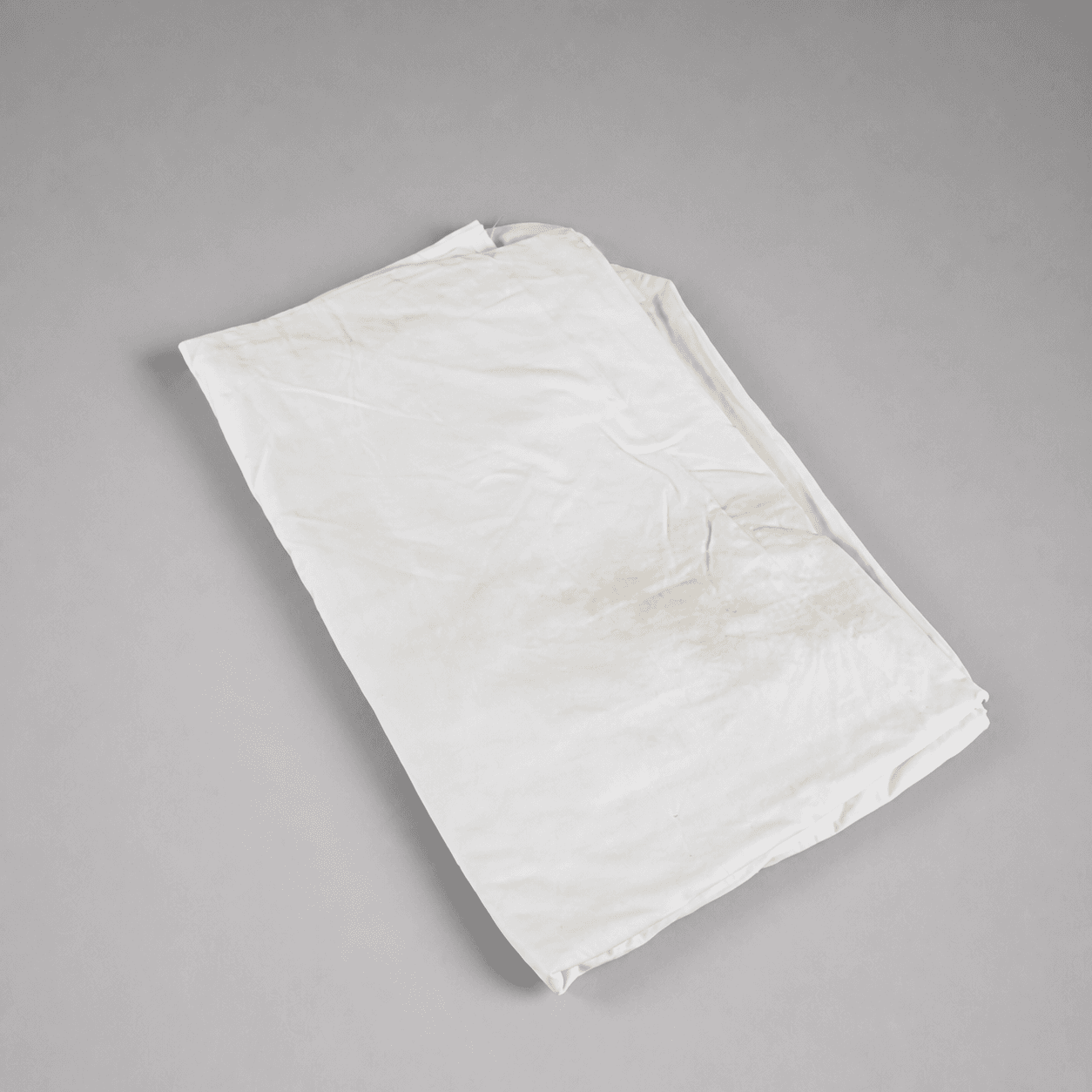 Weißes Textil mit Fleck — Foto 1