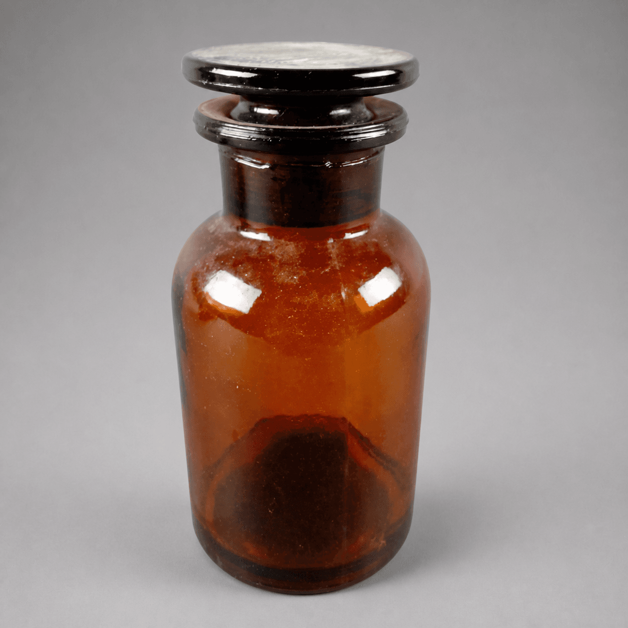 Brown Laboratory Bottle with Dark Filling — Photo 1