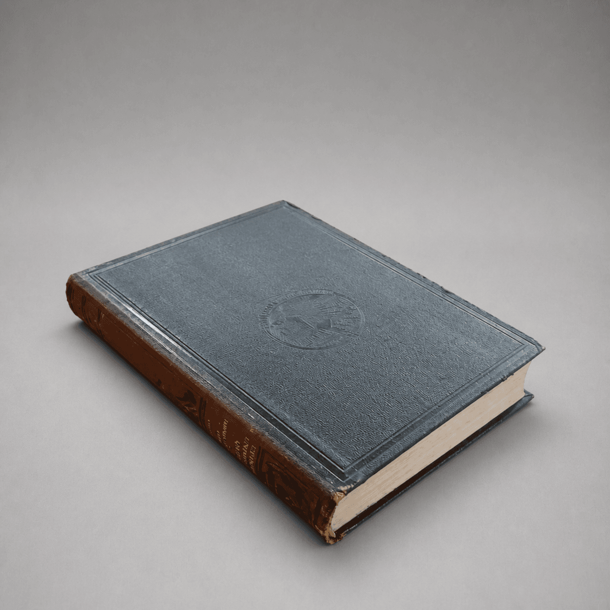 Grey book with embossed emblem — Photo 1